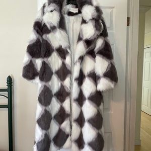 NWOT Faux fur coat by Yegilila, super pretty.